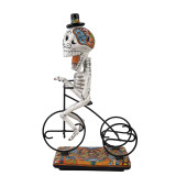 Catrin Ciclista - traditionelle Figur mit Talaver-Motiv
