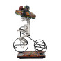Ciclista Catrina - Statue von La Catrina auf einem Fahrrad 